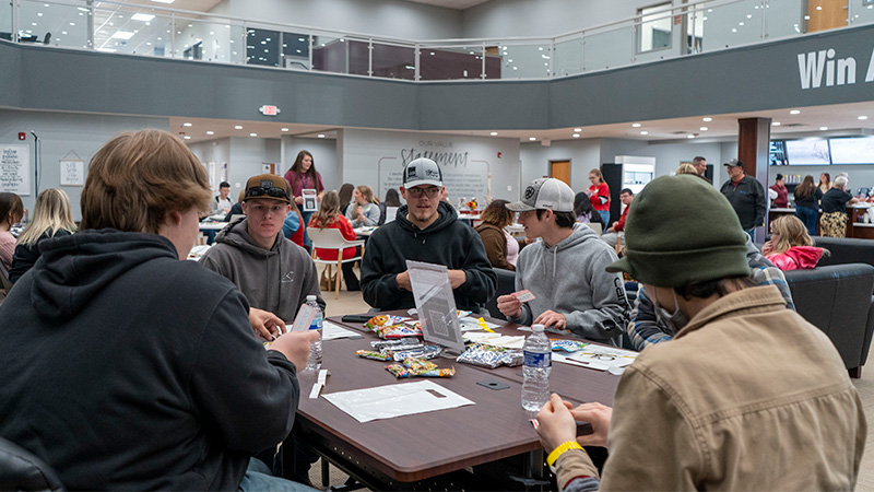 Photo of students at a table in the library