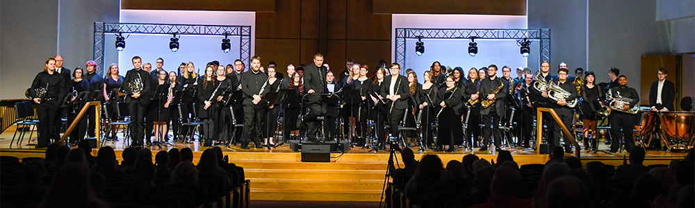 Photo of student musicians on stage facing audience
